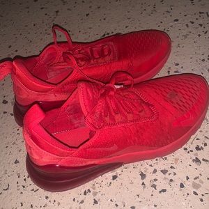 Red Nike air shoes.